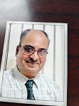 Com. R. B. Raswalkar