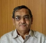 Com. M. M. Vaidhya